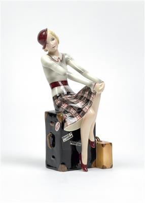 Stephan Dakon, a young lady with a small hat sitting on two suitcases, designed c. 1935, executed by Wiener Manufaktur Friedrich Goldscheider, by 1941 - Secese a umění 20. století