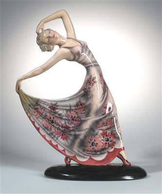 Josef Lorenzl, a female dancer posing, holding her dress open with her right hand, standing on an oval base, designed in c. 1935, executed by Wiener Manufaktur Friedrich Goldscheider, by c. 1941 - Secese a umění 20. století