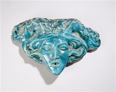 A fountain relief of a gargoyle in the shape of a woman’s face with waving hair, designed in c. 1920 - Jugendstil and 20th Century Arts and Crafts