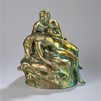 A group of figures: a kneeling male figure with recumbent female nude on a rock, executed by Zsolnay, Pécs, c. 1930 - Jugendstil and 20th Century Arts and Crafts