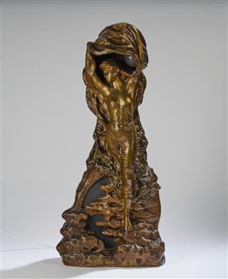 A tall bronze lamp with a female figure with raised arms standing on a rock, c. 1920/30 - Jugendstil e arte applicata del XX secolo