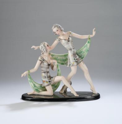 Stephan Dakon, a group: two female dancers, one kneeling, the other standing, on an oval base, model number 8498, designed in around 1939, executed by Wiener Manufaktur Friedrich Goldscheider, by c. 1941 - Jugendstil e arte applicata del XX secolo