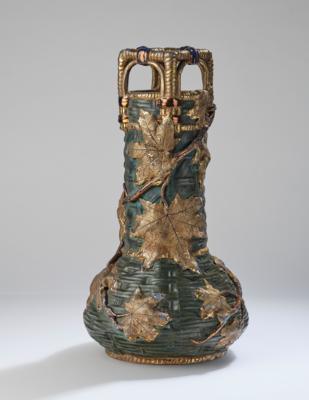 A tall handled vase with raised branches and vine leaves, Amphorawerke Riessner, Stellmacher & Kessel, Turn-Teplitz, c. 1905/18 - Secese a umění 20. století