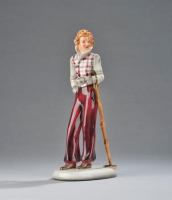 Stephan Dakon, a skier (skier standing with ski pole) on a oval base, model number 7149, designed in around 1935, executed by Wiener Manufaktur Friedrich Goldscheider, by c. 1941 - Secese a umění 20. století