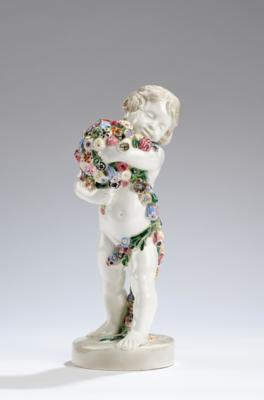 Hans Schoerk (Schörck), a standing putto with a flower garland, on a round base, model number 4769, designed in around 1916/17, executed by Wiener Manufaktur Friedrich Goldscheider, by 1920 - Secese a umění 20. století