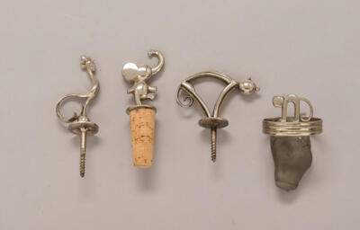 Three bottle stoppers (“Korken”) with animals: elephant (model number 2369K), cat (model number 2106K) and rooster as well as a napkin ring with cat, Werkstätte Hagenauer, Vienna - Jugendstil and 20th Century Arts and Crafts