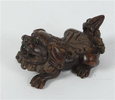 Netsuke eines Shishi, - Antiquitäten