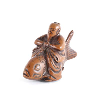 Netsuke des Kinko Sennin auf Fisch, Japan, 19. Jh. - Starožitnosti