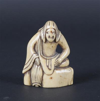 Netsuke eines sitzenden Mannes, - Antiquitäten