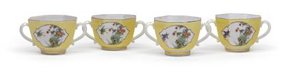 A double handle cup, - Glass and porcelain