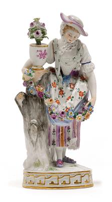 A figure of a young lady holding floral garland, - Glass and porcelain