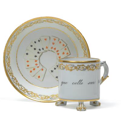 "Pont de misére, que celle sur table" A cup and a saucer decorated with cards, - Vetri e porcellane