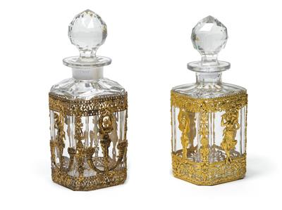 Two carafes with stoppers and gilt mounts, - Glass and porcelain