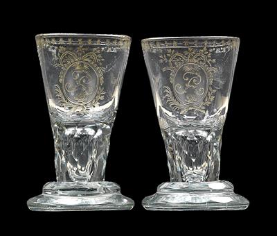 A pair of glasses with sun design, monogram and skull, - Glass and porcelain