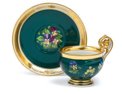 A teacup and saucer with symbols of love, - Glass and porcelain