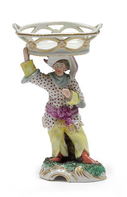 A Chinese figure carrying a basket of flowers on its head, - Glass and porcelain