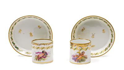 A pair of cups with saucers and matching amorettes among the clouds, - Glass and porcelain