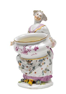 A seated serving girl with an oval tureen, - Sklo, Porcelán