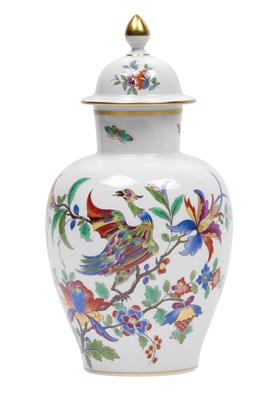 A lidded vase with a phoenix in a flowering tree, - Glass and porcelain
