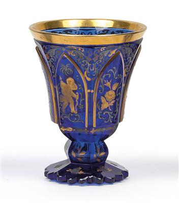 A goblet decorated with amorettes, - Glass and porcelain