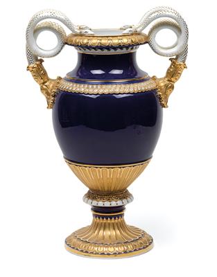 A vase with double serpent handles, - Glass and porcelain