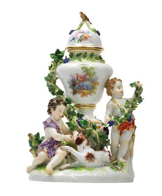 A lidded vase decorated with children and a dog, - Glass and porcelain