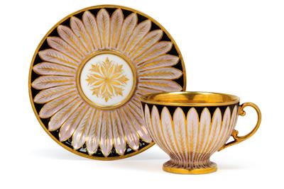 A cup and saucer decorated with petals, - Glass and porcelain