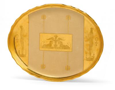 A presentation platter with Egyptian-style decoration, - Glass and porcelain