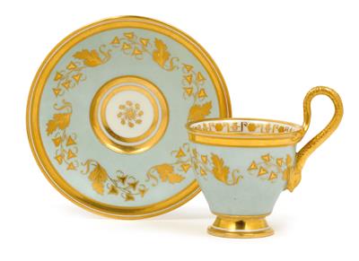 An exquisite cup with gold dolphin handles and saucer, - Sklo, Porcelán