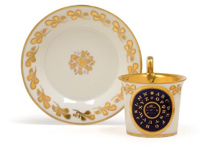 A cup with gilt alphabet and saucer, - Glass and porcelain