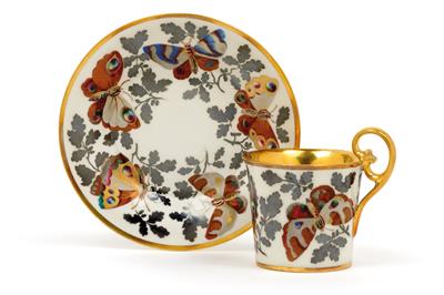 A cup and saucer with butterflies, - Glass and porcelain