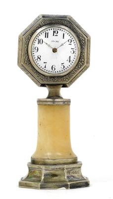 A small silver table clock - Antiquariato - orologi, metalli lavorati, asiatica, ceramica faentinas, arte popolare, sculture