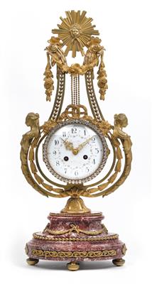 A neoclassical lyre clock - Orologi, metalli lavorati, arte popolare e ceramica faentina, sculture  +Strumenti scientifici e globi d'epoca