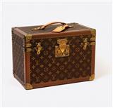 At Auction: Louis Vuitton, LOUIS VUITTON COSMETIC CASE France, 20th Century  Height 8”. Width 16”. Depth 9”.