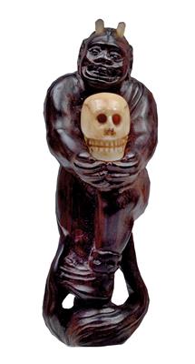 A netsuke of an oni with skull, Japan, Meiji period, signed - Starožitnosti