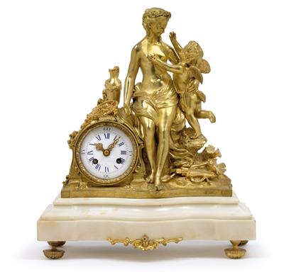 An ormolu mantlepiece clock from France - Umění a starožitnosti