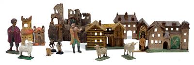 A set of nativity figures and houses, - Umění a starožitnosti