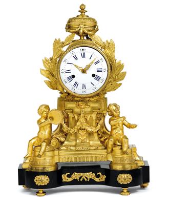 An ormolu mantelpiece clock - Umění a starožitnosti
