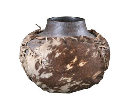 Shona or Ndebele, Zimbabwe: A large beer jug, sewn in cow fur. - Tribal Art