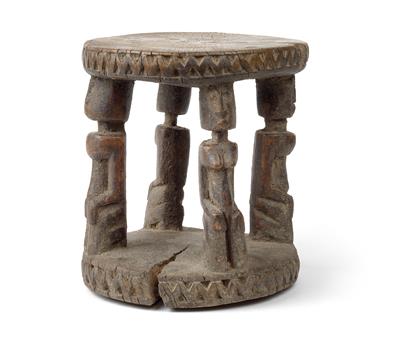 Dogon, Mali: A typical stool of the Dogon, with four supporting caryatid figures. - Arte Tribale