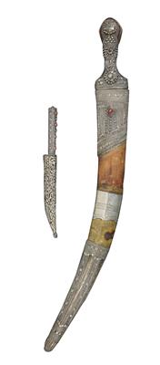 Mixed lot (2 items): Saudi Arabia and Ottoman Empire: A curved dagger (‘Wahabite Jambiya’), and an Ottoman-Turkish knife. Both pieces with sheath and rich silver décor. - Tribal Art