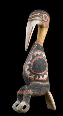 New Guinea, Abelam, Maprik Region: A hornbill of carved wood, painted red, white, yellow and black with natural dyes.  A sun symbol on both sides. - Tribal Art