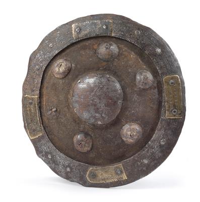 Orient, from Persia to India: An old, small round shield made of leather, reinforced with iron and decorated with brass. - Tribal Art
