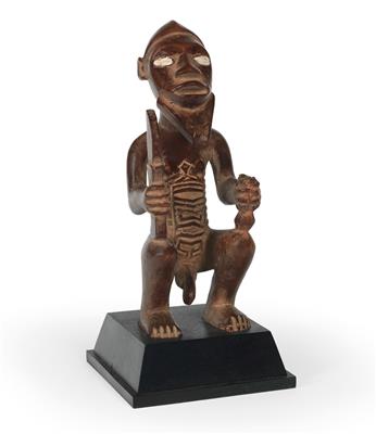 Bembe, Republic of the Congo (Congo-Brazzaville): a male, squatting and unusually large ancestor figure of western Bembe, called ‘Bimbi’ or ‘Kiteki’. - Tribal Art