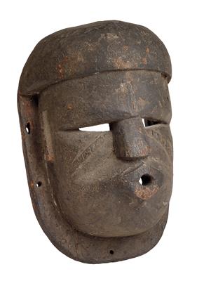 Ibibio, Nigeria: A small, black mask with flat border, probably depicting the good spirit ‘Mfon’. - Tribal Art