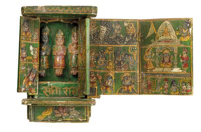 India: A small Hindu house-temple shaped as a ‘winged altar’. Made of wood, with a large bipartite wing, two smaller wings inside and the figures of the gods Brahma, Vishnu, Shiva. Richly painted. - Tribal Art
