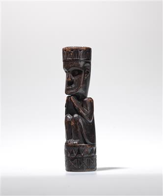 A small seated Batak ancestor figure. - Tribal Art
