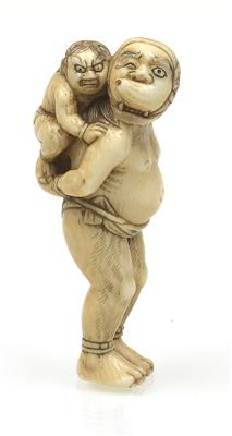 An ivory netsuke of an oni with an oni boy on his back - Asian art