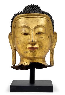 A large head of Buddha - Asian art