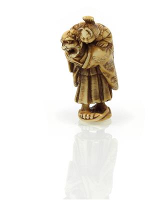 A netsuke of an oni carrying Okame. Japan, 19th cent. - Asian art